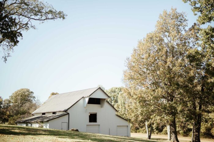 Hill and white barn